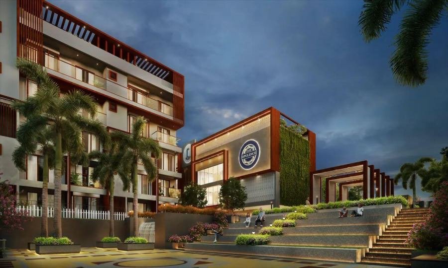Clubhouse building with landscaped steps and palm-lined approach