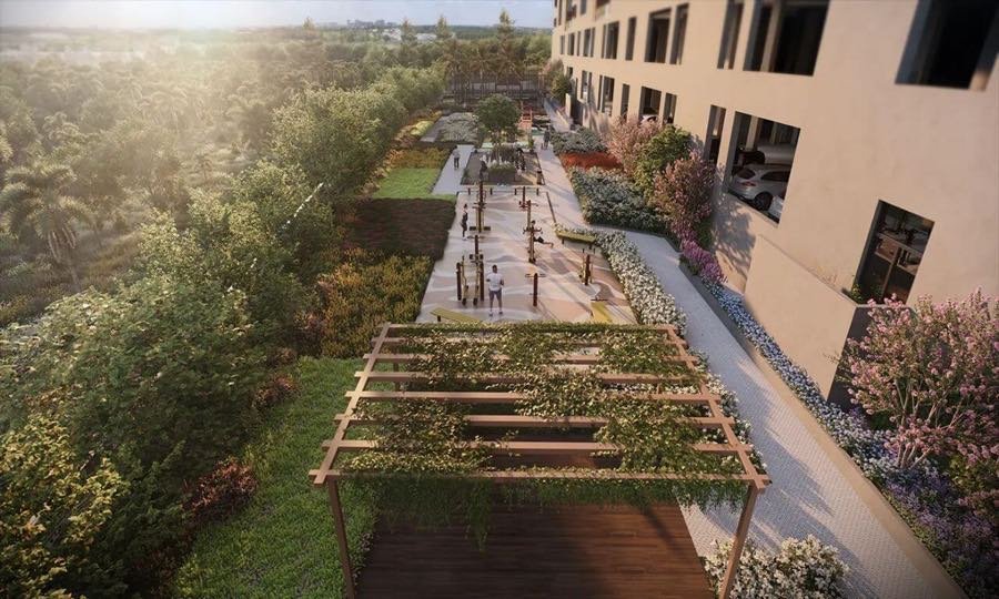 Landscaped walkway with pergola seating along the edge of the community